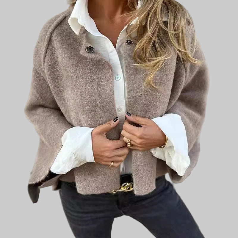 Kort elegant jasje met uitlopende mouwen