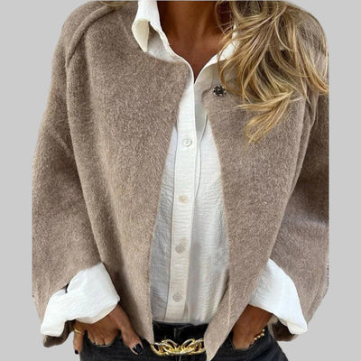 Kort elegant jasje met uitlopende mouwen